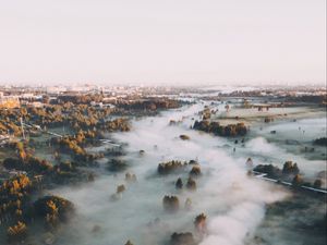 Preview wallpaper town, fog, aerial view, trees, hills