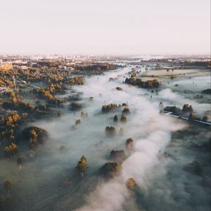 Preview wallpaper town, fog, aerial view, trees, hills