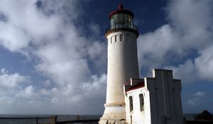 Preview wallpaper town, lighthouse, sky, blue, building