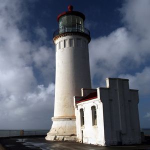 Preview wallpaper town, lighthouse, sky, blue, building