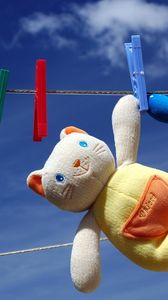 Preview wallpaper toy, cat, clothesline, dry, clothespin