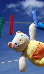 Preview wallpaper toy, cat, clothesline, dry, clothespin