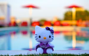 Preview wallpaper toy, kitten, bow, cute