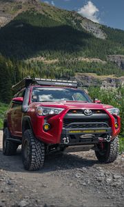 Preview wallpaper toyota 4runner, toyota, car, red, rocks