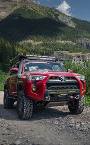 Preview wallpaper toyota 4runner, toyota, car, red, rocks