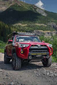 Preview wallpaper toyota 4runner, toyota, car, red, rocks