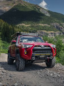 Preview wallpaper toyota 4runner, toyota, car, red, rocks