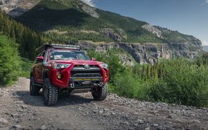 Preview wallpaper toyota 4runner, toyota, car, red, rocks