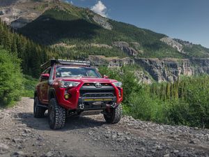 Preview wallpaper toyota 4runner, toyota, car, red, rocks