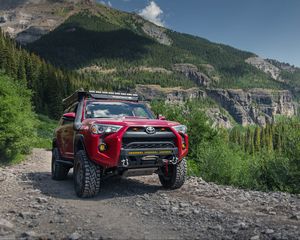 Preview wallpaper toyota 4runner, toyota, car, red, rocks