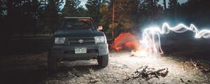 Preview wallpaper toyota, car, freezelight, camping, night
