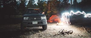 Preview wallpaper toyota, car, freezelight, camping, night