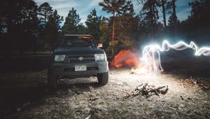 Preview wallpaper toyota, car, freezelight, camping, night