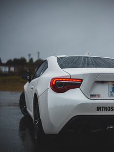 Preview wallpaper toyota, car, rear view, white, wet