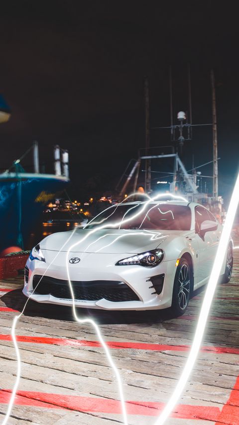 480x854 Wallpaper toyota, car, sports car, lightning, glow