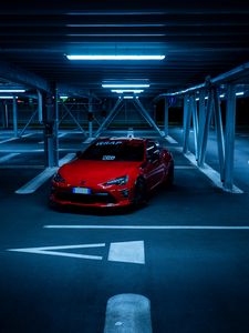 Preview wallpaper toyota, car, sports car, parking, red