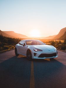 Preview wallpaper toyota, car, sports car, side view, white, road