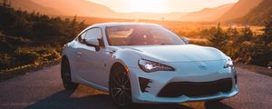 Preview wallpaper toyota, car, sports car, side view, white, road