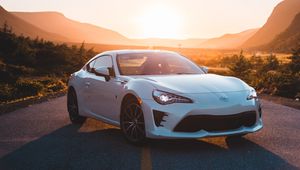 Preview wallpaper toyota, car, sports car, side view, white, road