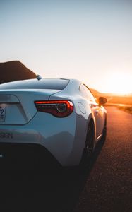 Preview wallpaper toyota, car, sports car, rear view, white, sunset