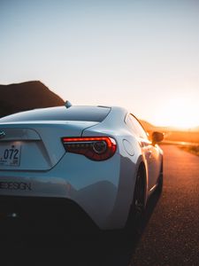 Preview wallpaper toyota, car, sports car, rear view, white, sunset