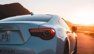 Preview wallpaper toyota, car, sports car, rear view, white, sunset