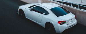 Preview wallpaper toyota, car, sports car, side view, white, building
