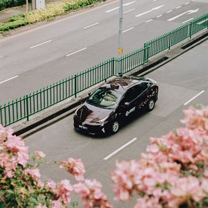 Preview wallpaper toyota, car, sports car, aerial view, branches