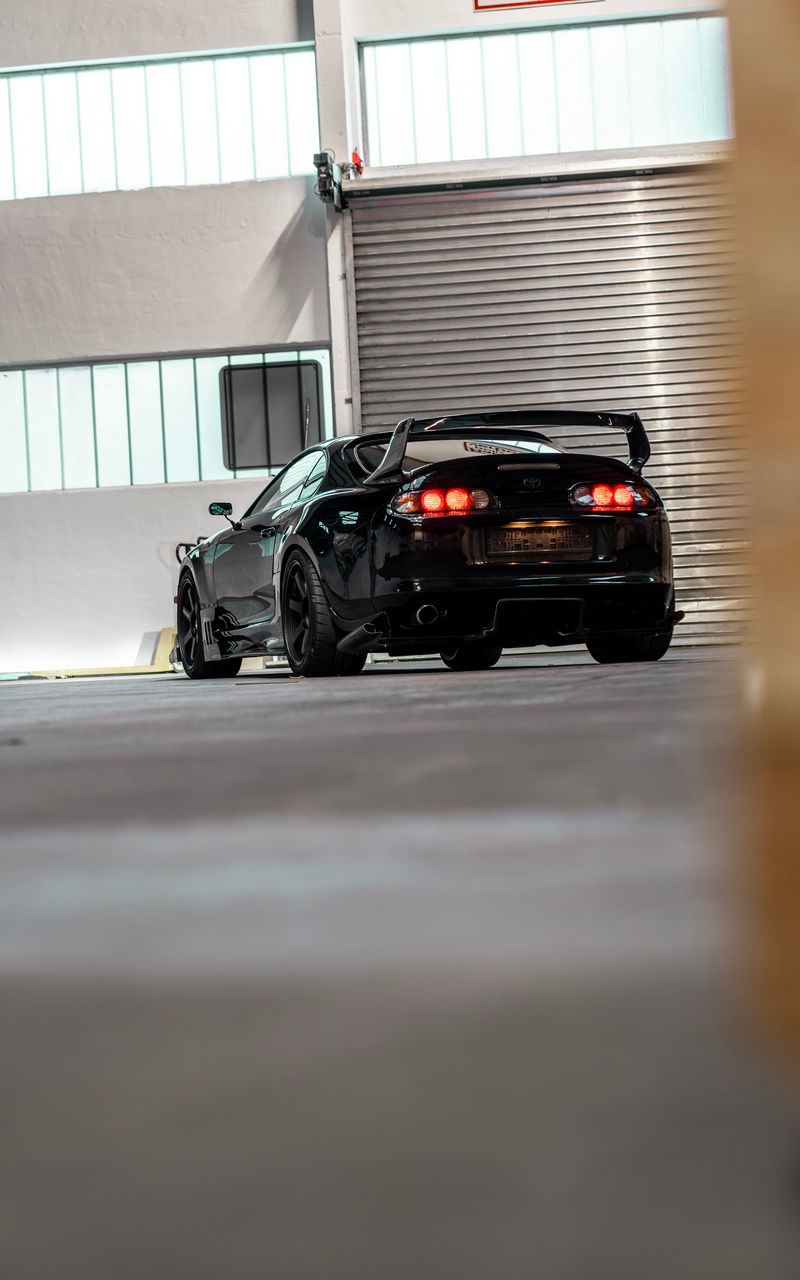 800x1280 Wallpaper toyota, car, sports car, black, rear view