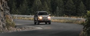 Preview wallpaper toyota, car, suv, front view, road, rock