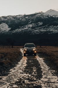 Preview wallpaper toyota, car, suv, front view, rocks, road