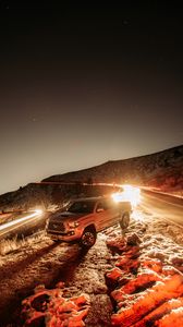 Preview wallpaper toyota, car, suv, gray, light, long exposure, road