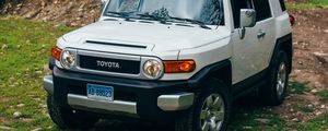 Preview wallpaper toyota fj cruiser, toyota, car, suv, gray, forest, grass