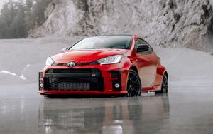 Preview wallpaper toyota gr yaris, toyota, car, red, front view, beach