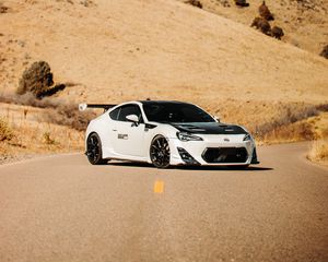 Preview wallpaper toyota gt86, toyota, sports car, car, white, road, hills