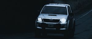 Preview wallpaper toyota hilux, toyota, car, suv, gray, road, dark