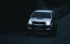 Preview wallpaper toyota hilux, toyota, car, suv, gray, road, dark