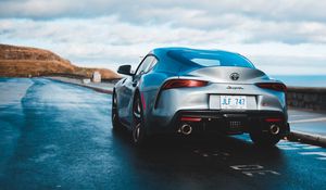 Preview wallpaper toyota supra, toyota, car, sportscar, gray, rear view, road