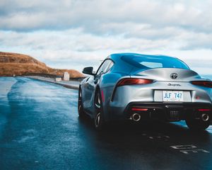 Preview wallpaper toyota supra, toyota, car, sportscar, gray, rear view, road