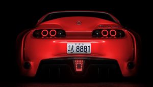 Preview wallpaper toyota supra, toyota, sportscar, red, rear view, dark, backlight