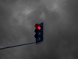 Preview wallpaper traffic light, glow, red, clouds