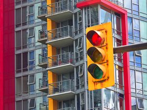 Preview wallpaper traffic light, house, building, architecture, balconies