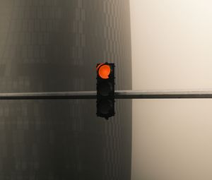 Preview wallpaper traffic light, pillar, building, skyscraper, fog