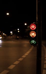 Preview wallpaper traffic light, symbol, bike, glow, night