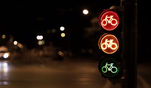 Preview wallpaper traffic light, symbol, bike, glow, night