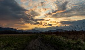 Preview wallpaper trail, field, grass, mountains, trees, clouds, landscape
