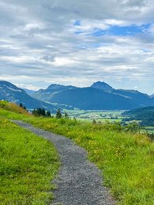 Preview wallpaper trail, mountains, grass, sky, clouds