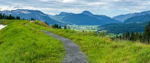 Preview wallpaper trail, mountains, grass, sky, clouds