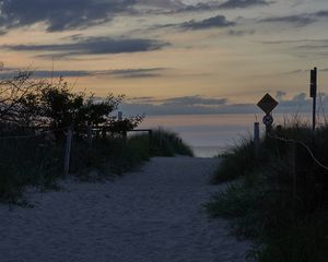 Preview wallpaper trail, sand, footprints, grass, sea, sky, nature