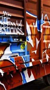 Preview wallpaper trailer, car, graffiti, colorful, metal